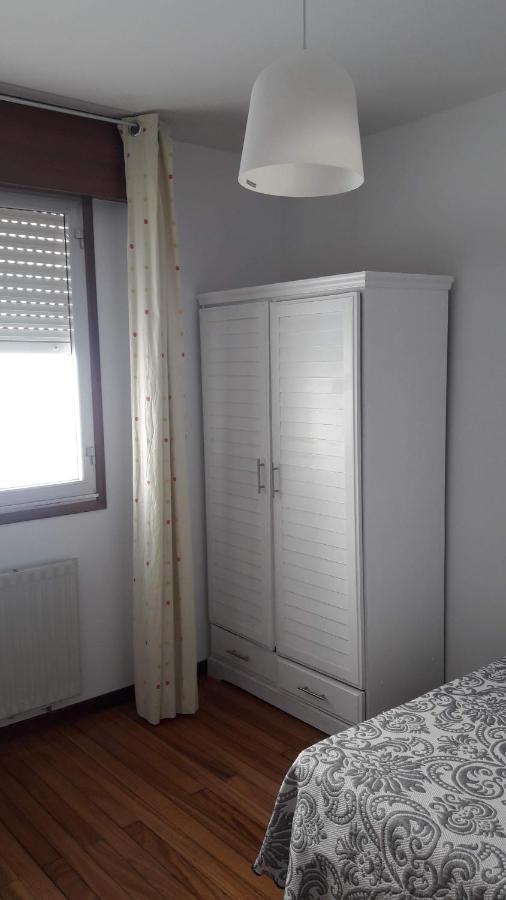 Atico Vacacional Apartment Muros Exterior photo