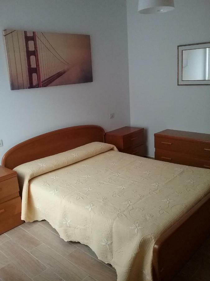 Atico Vacacional Apartment Muros Exterior photo